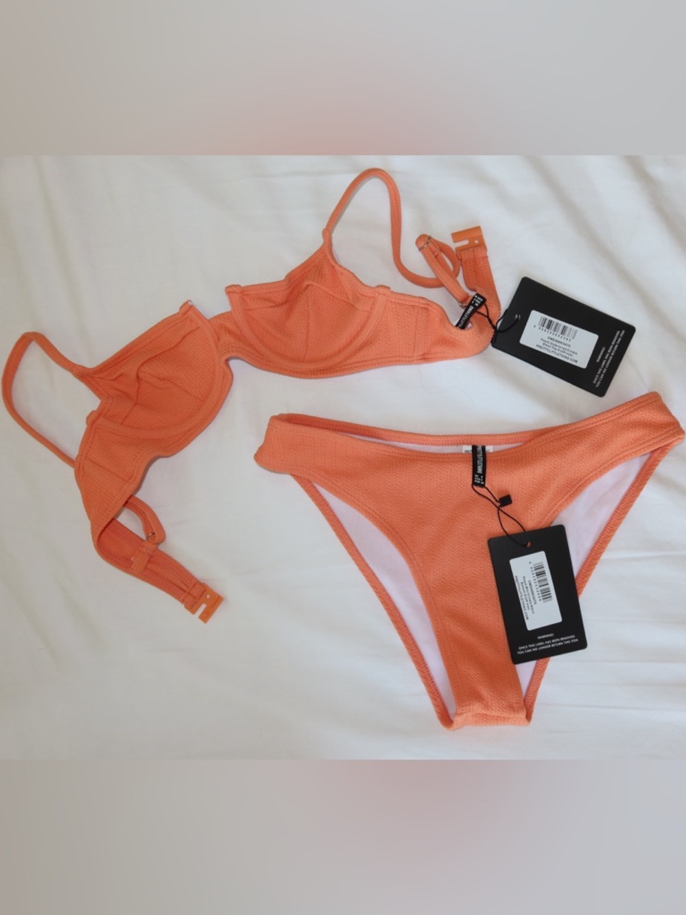 Pretty Little Thing Bikini 
Crinkle Peach Size Small
NEVER WORN TAGS